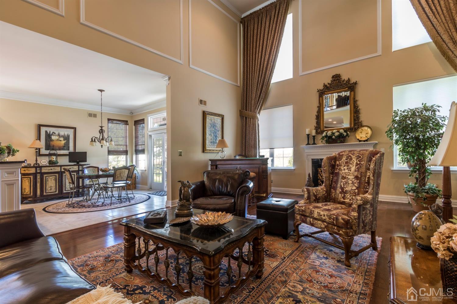 28 Kings Mill Road Monroe Township, NJ 08831 - Photo 11 of 42 a living room with fireplace furniture and a rug