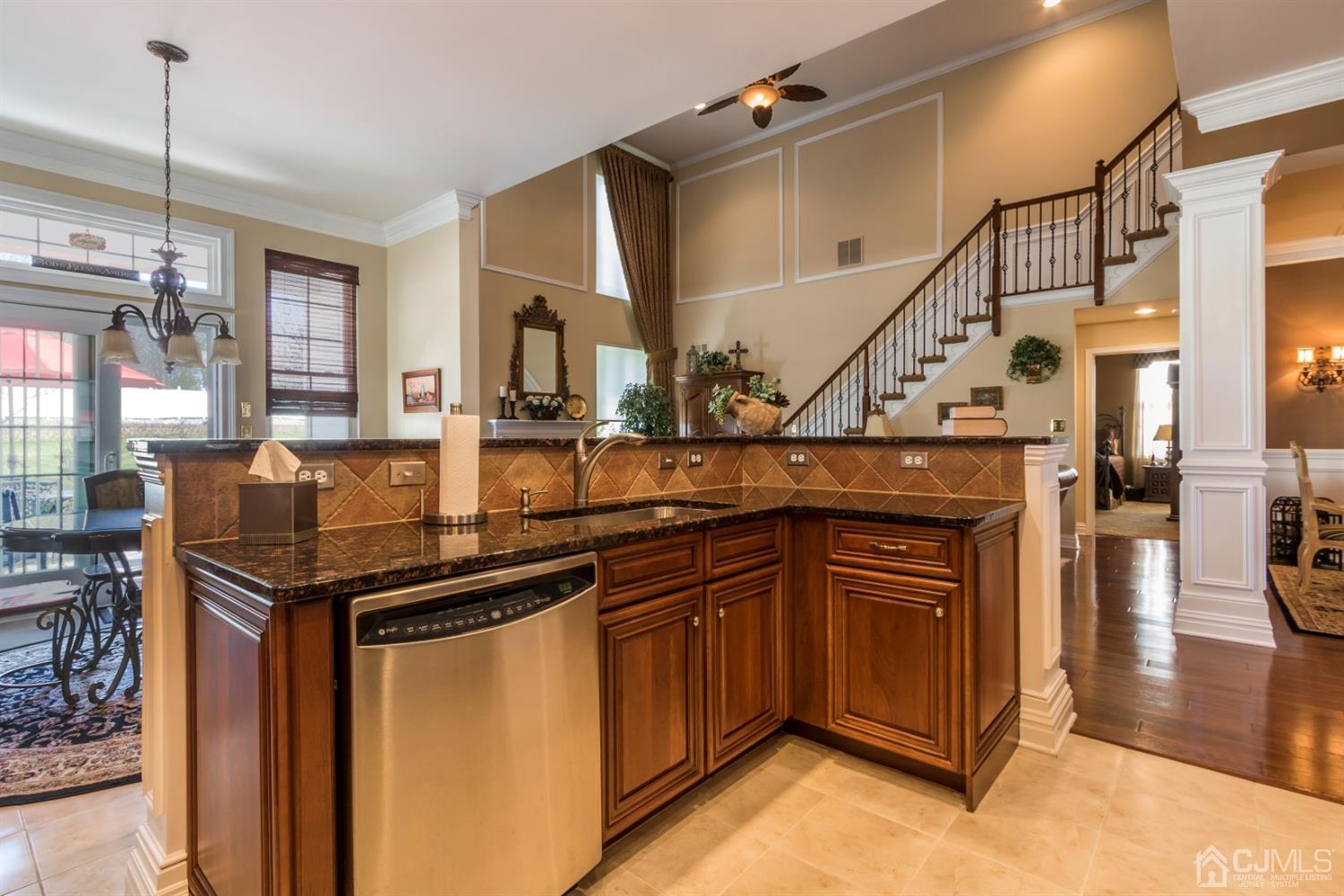28 Kings Mill Road Monroe Township, NJ 08831 - Photo 18 of 42 a kitchen with stainless steel appliances granite countertop a sink and a cabinets