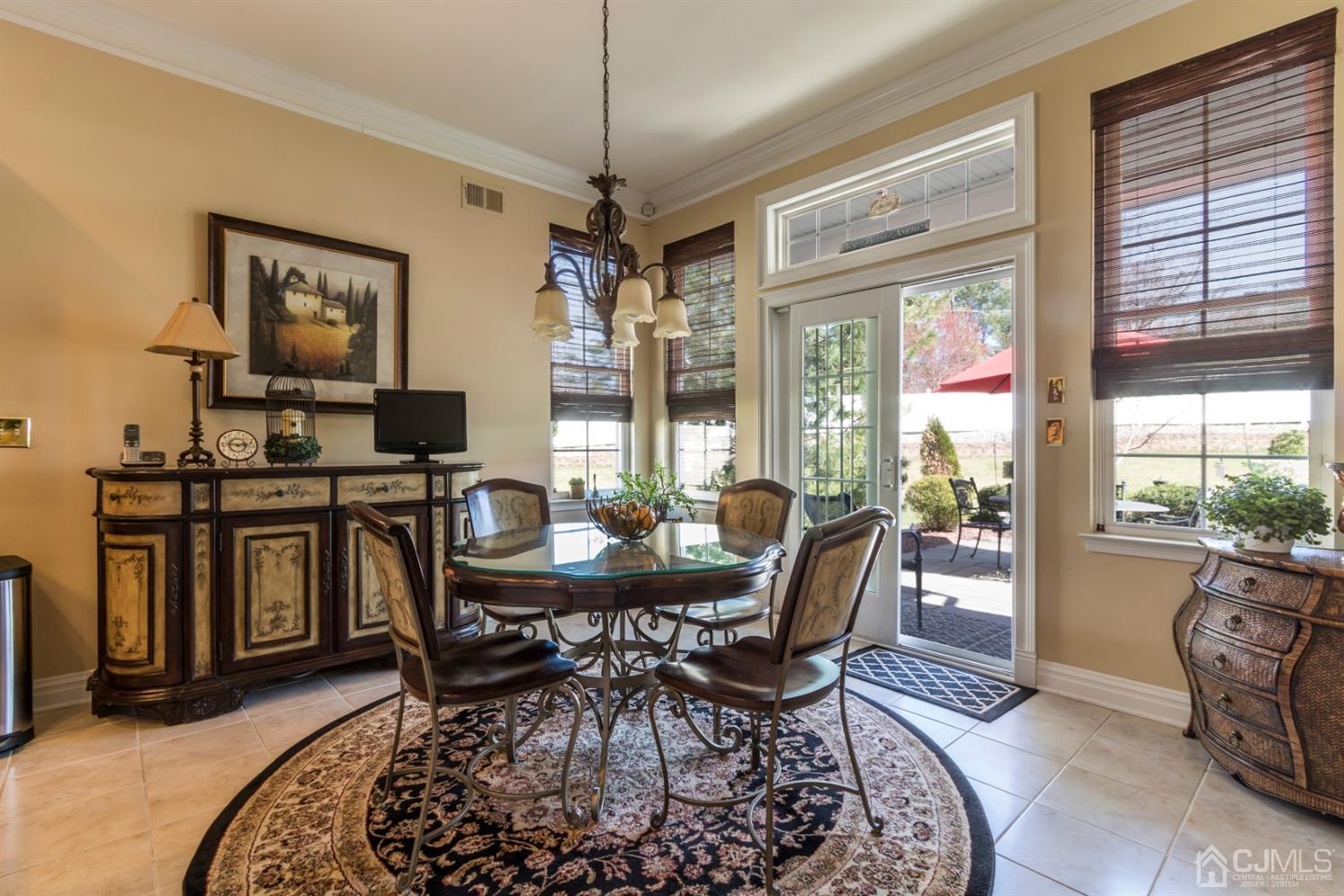 28 Kings Mill Road Monroe Township, NJ 08831 - Photo 19 of 42 a view of a dining room with furniture window and outside view