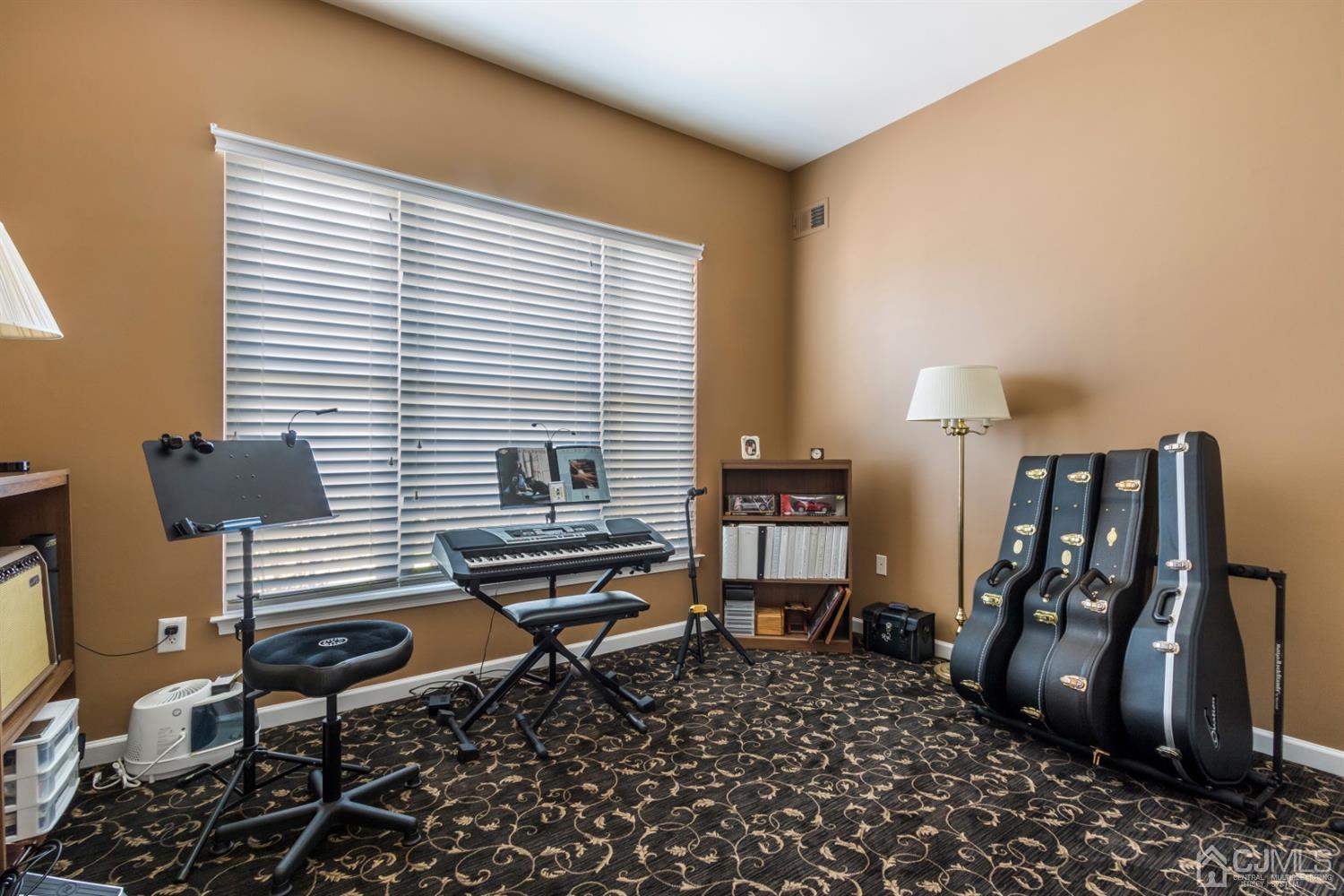 28 Kings Mill Road Monroe Township, NJ 08831 - Photo 23 of 42 a view of a workspace with furniture and a window