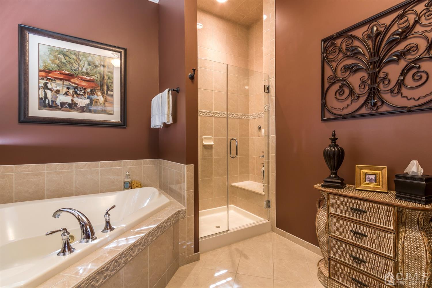 28 Kings Mill Road Monroe Township, NJ 08831 - Photo 30 of 42 a bathroom with a tub and sink