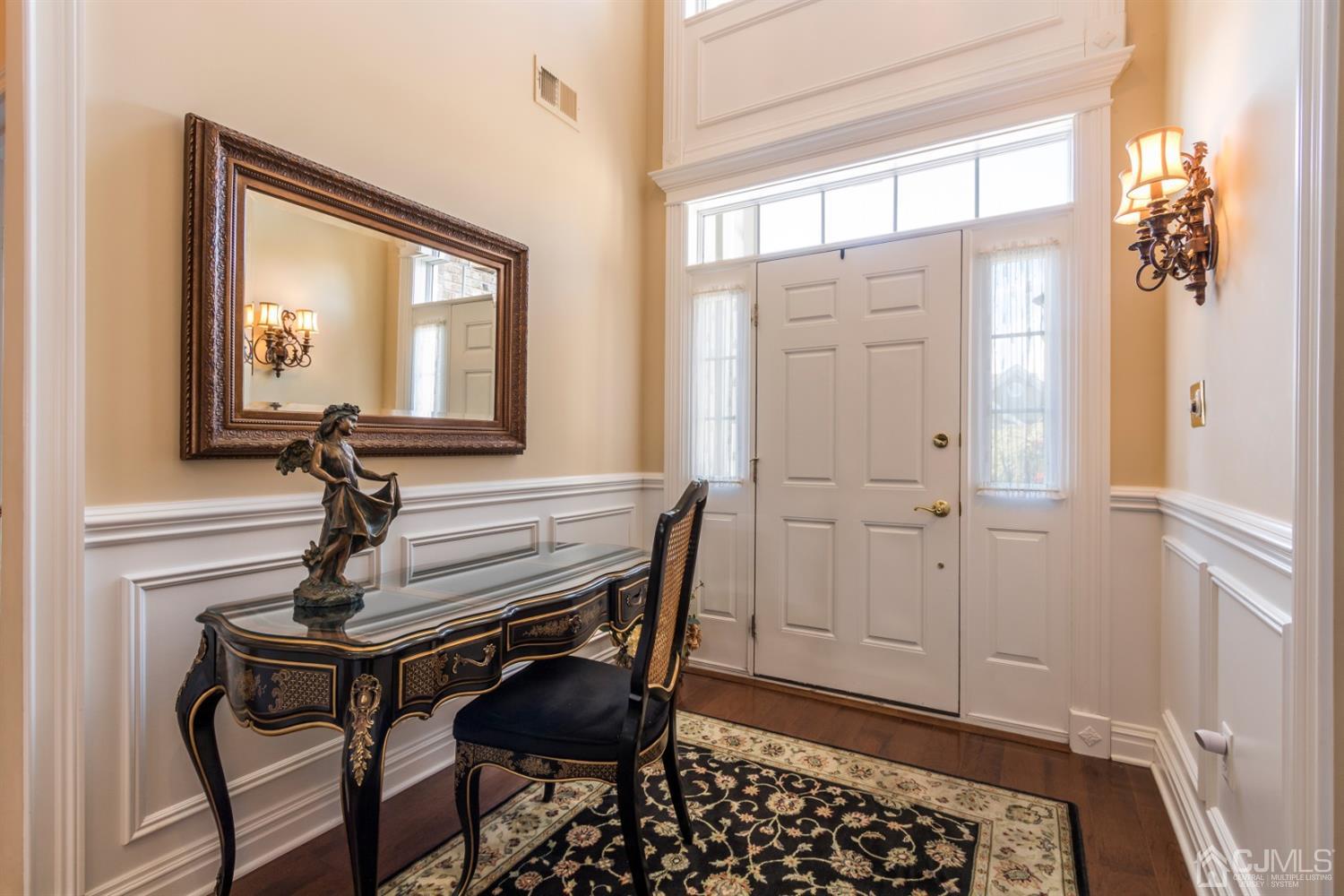 28 Kings Mill Road Monroe Township, NJ 08831 - Photo 4 of 42 a room with wooden floor and windows