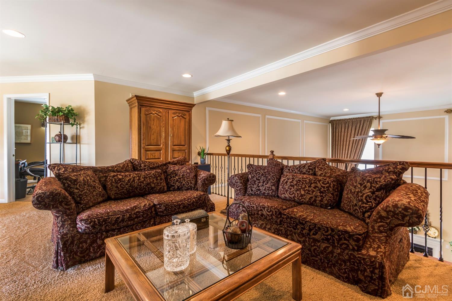 28 Kings Mill Road Monroe Township, NJ 08831 - Photo 32 of 42 a living room with furniture and a couch