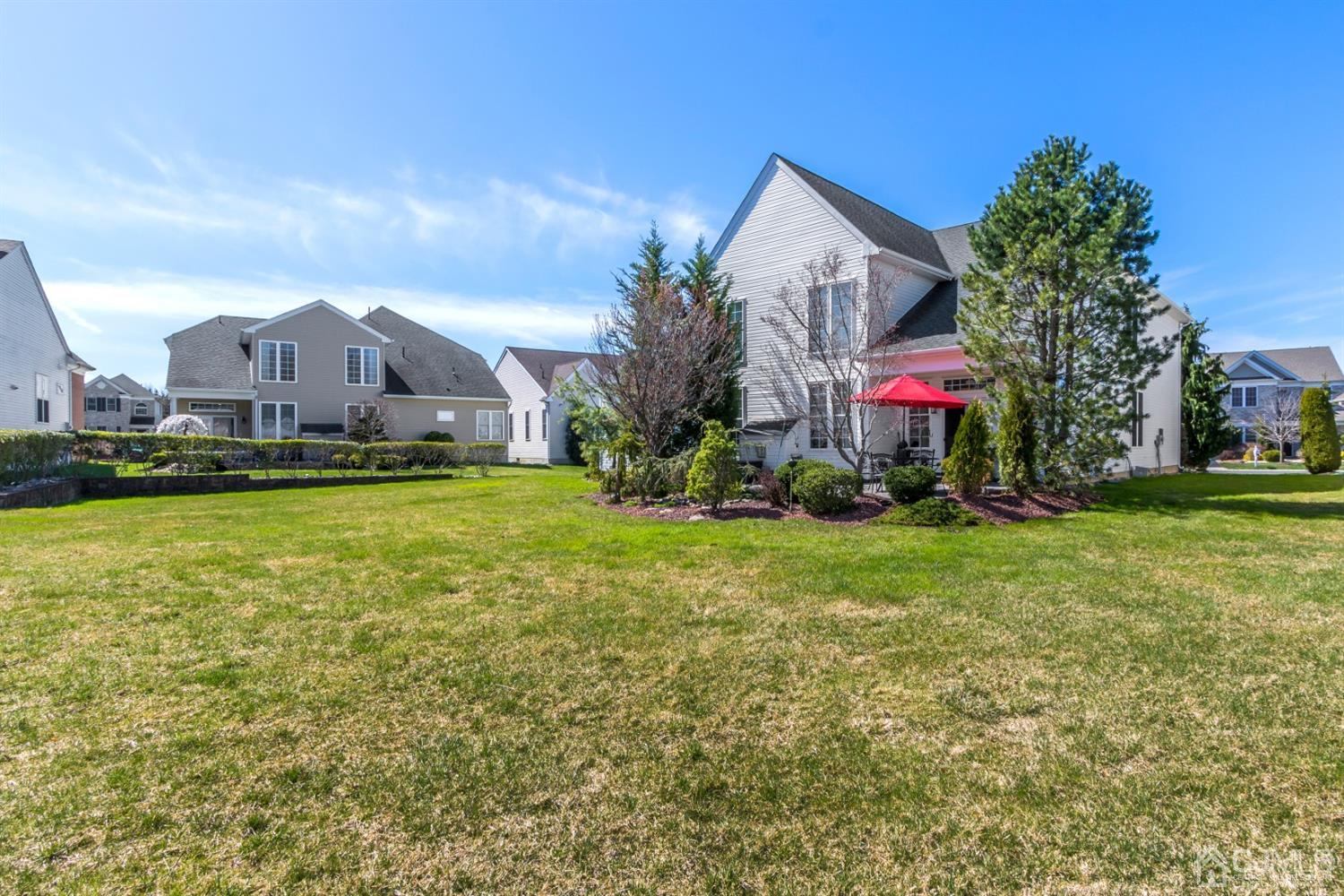 28 Kings Mill Road Monroe Township, NJ 08831 - Photo 42 of 42 a front view of house with yard and garage