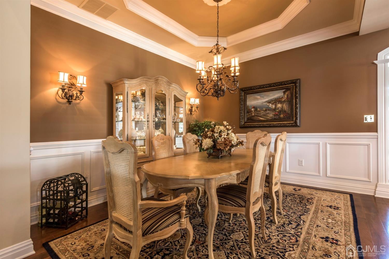 28 Kings Mill Road Monroe Township, NJ 08831 - Photo 8 of 42 a view of a dining room with furniture and chandelier