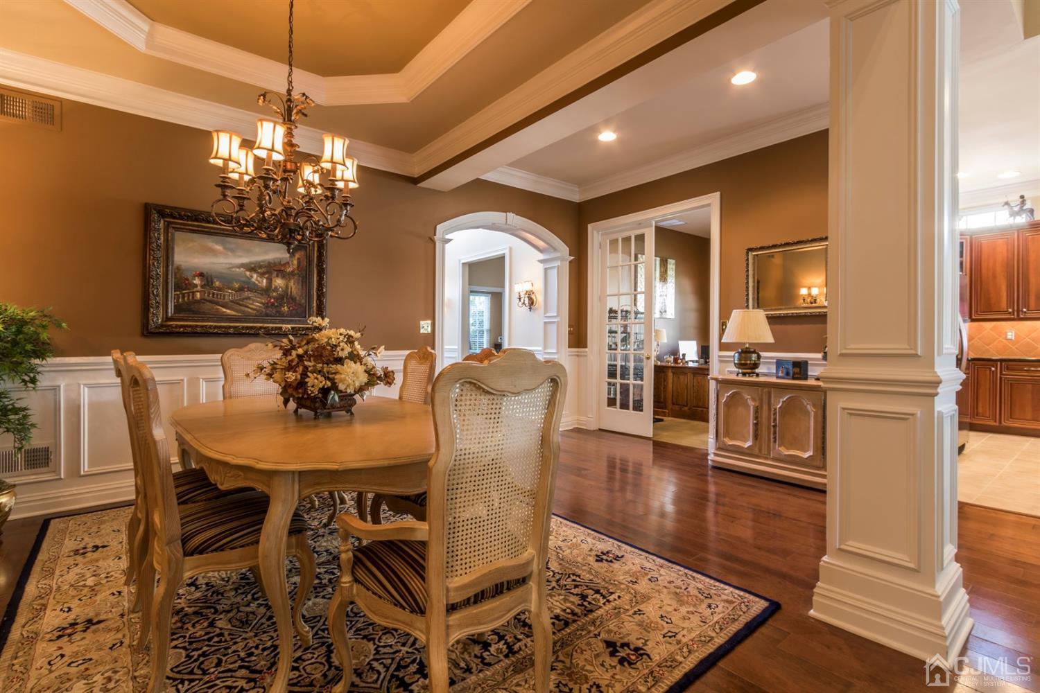 28 Kings Mill Road Monroe Township, NJ 08831 - Photo 9 of 42 a view of a dining room with furniture and chandelier