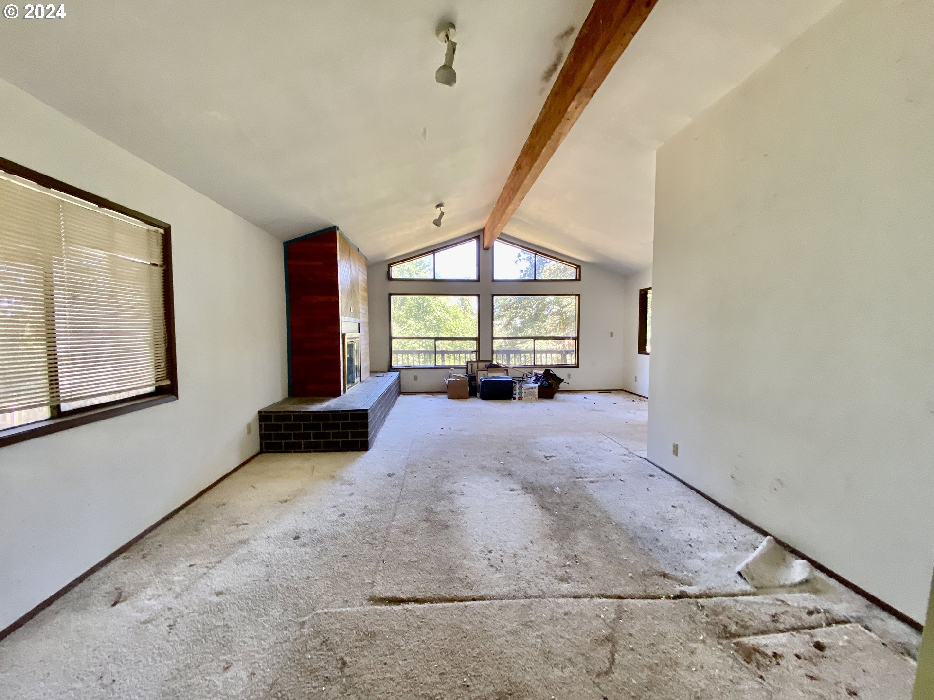 10909 South Ridgetop Drive Molalla, OR 97038 - Photo 17 of 28 a view of livingroom with furniture and floor to ceiling window
