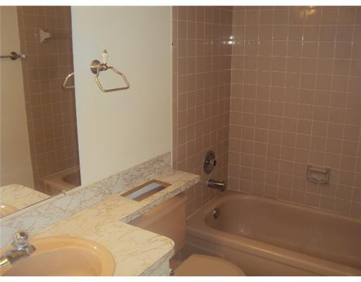 7331 Northwest 18th Street, Unit 204 Margate, FL 33063 - Photo 12 of 15 a bathroom with a bathtub