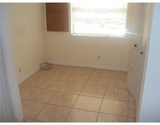 7331 Northwest 18th Street, Unit 204 Margate, FL 33063 - Photo 15 of 15 a view of an empty room and window