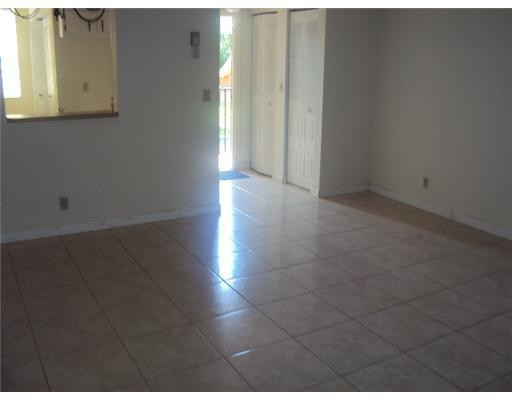 7331 Northwest 18th Street, Unit 204 Margate, FL 33063 - Photo 9 of 15 a view of a hallway