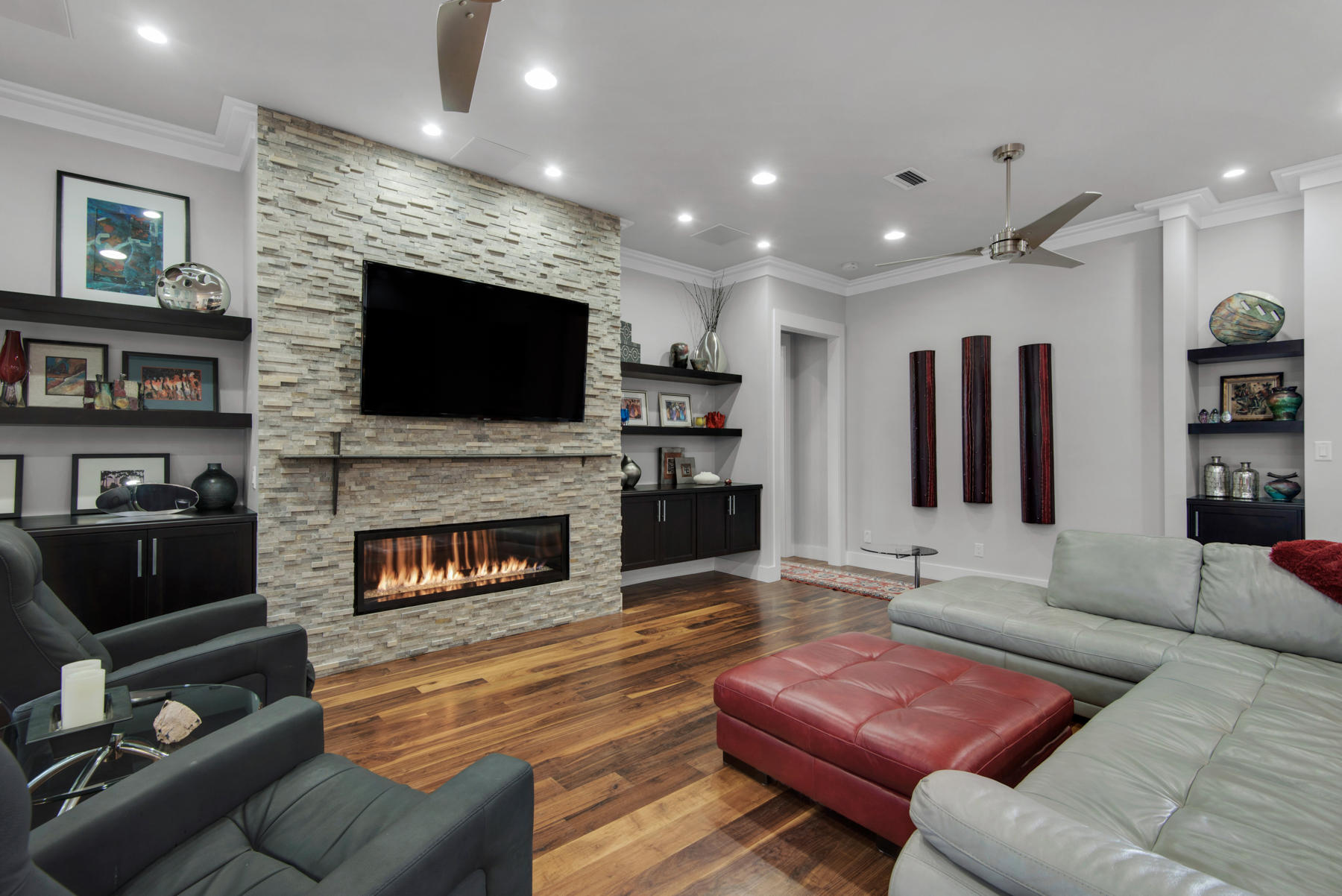 32 Joan Circle Santa Rosa Beach, FL 32459 - Photo 2 of 71 a living room with furniture a flat screen tv and a fireplace