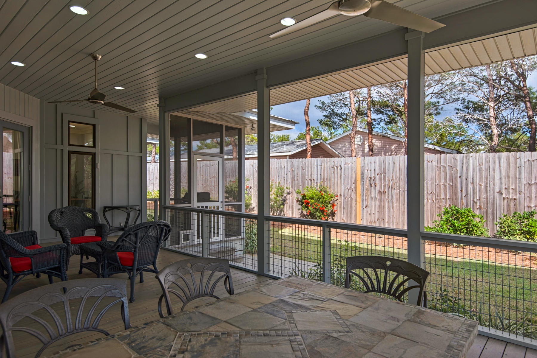 32 Joan Circle Santa Rosa Beach, FL 32459 - Photo 61 of 71 a view of a porch with chairs and backyard