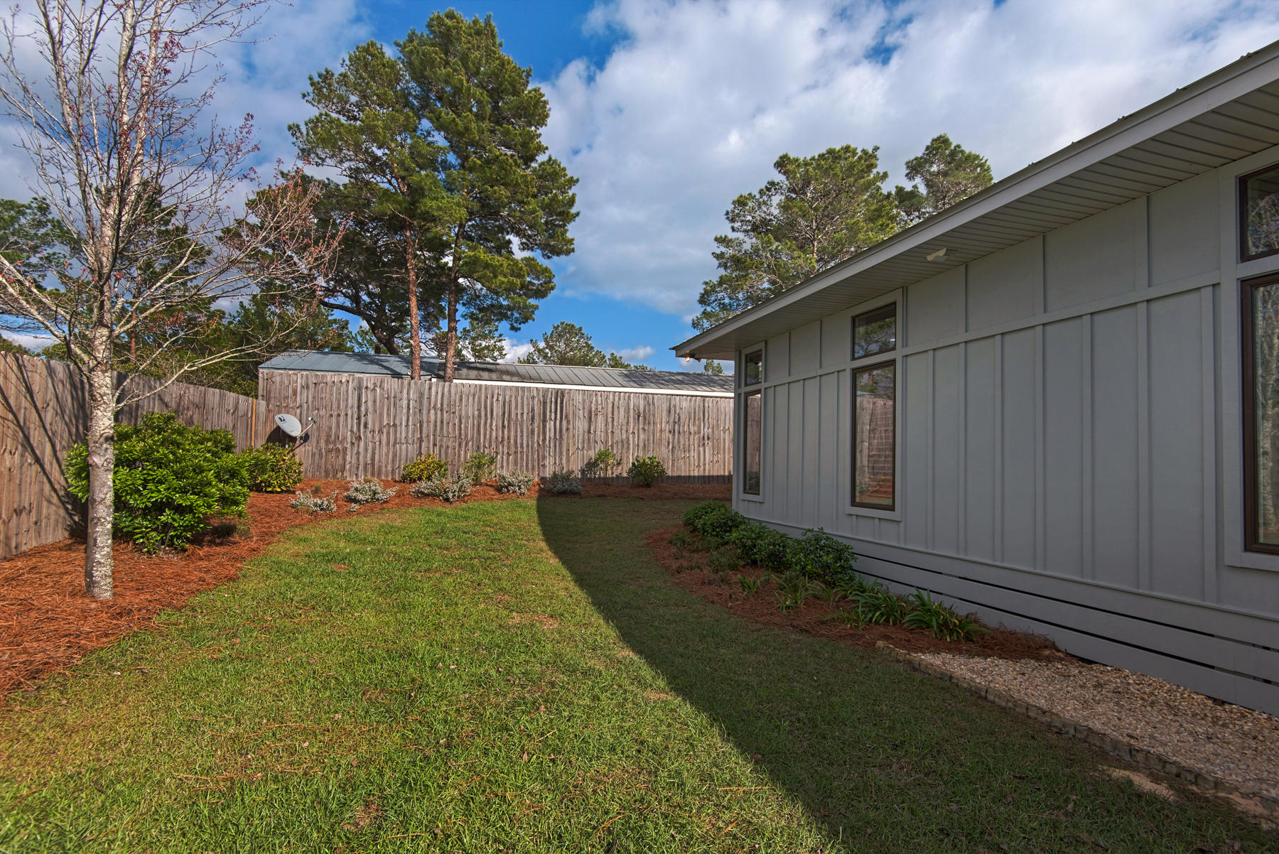 32 Joan Circle Santa Rosa Beach, FL 32459 - Photo 67 of 71 a backyard of a house with lots of green space
