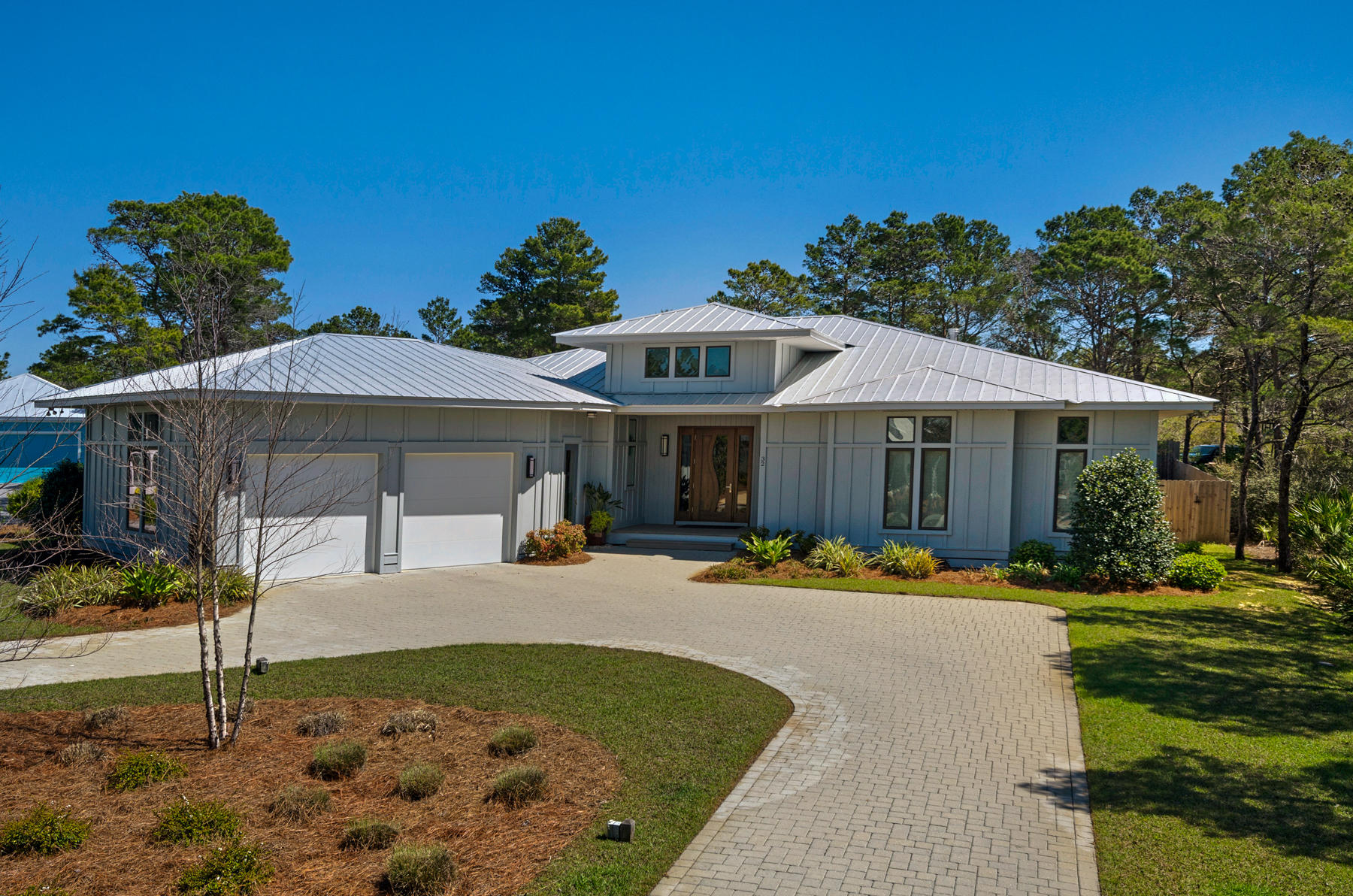 32 Joan Circle Santa Rosa Beach, FL 32459 - Photo 69 of 71 a front view of a house with a yard