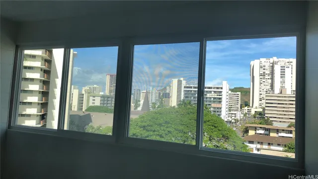 a view of a city from a living room