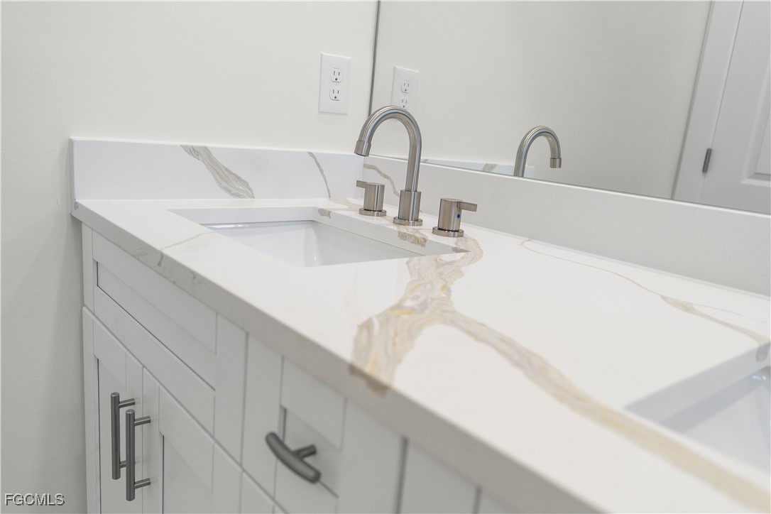 4545-4547 28th Street Southwest Lehigh Acres, FL 33973 - Photo 20 of 38 a close view of sink and tap