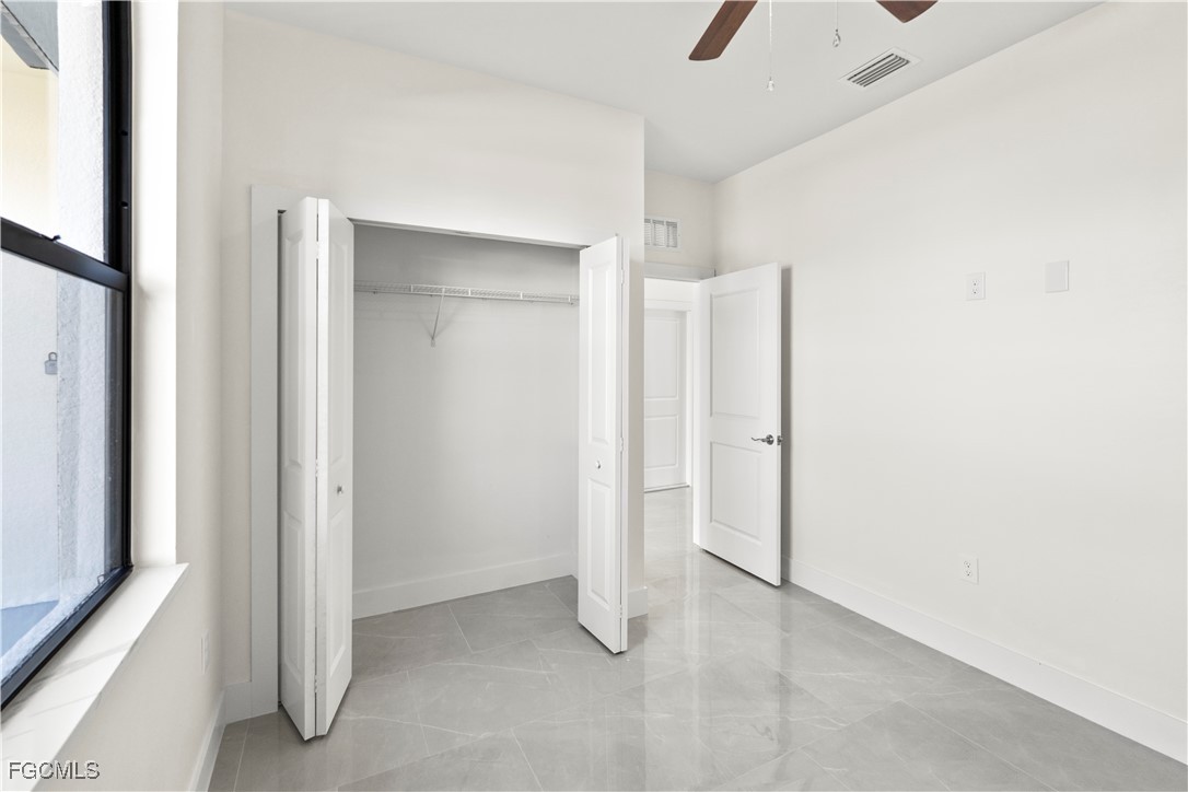 4545-4547 28th Street Southwest Lehigh Acres, FL 33973 - Photo 33 of 38 a view of an empty room