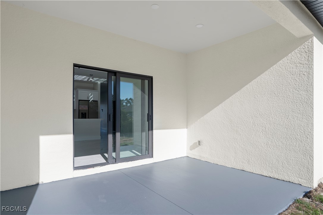 4545-4547 28th Street Southwest Lehigh Acres, FL 33973 - Photo 36 of 38 a view of a big room with closet and mirror