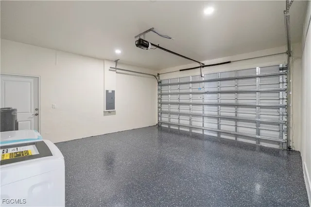a view of a storage & utility room with windows