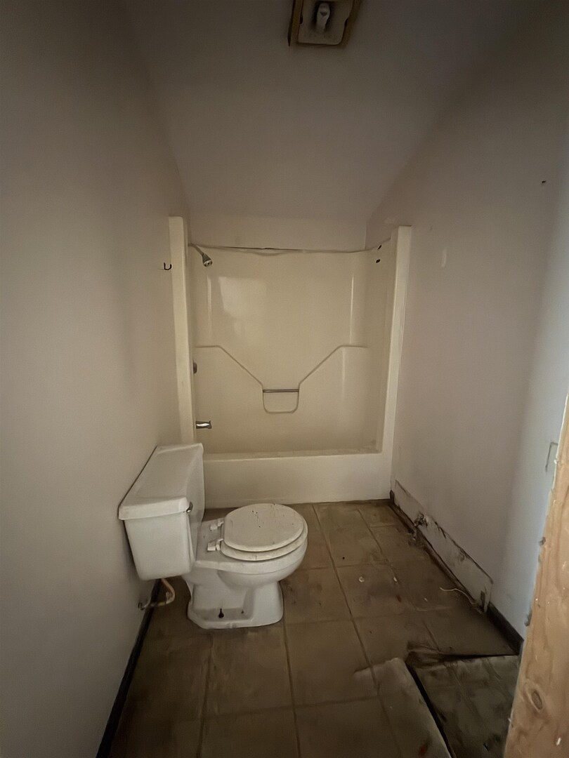 3657 Dillinger Road Carbondale, IL 62901 - Photo 17 of 22 a bathroom with a granite countertop sink and a toilet