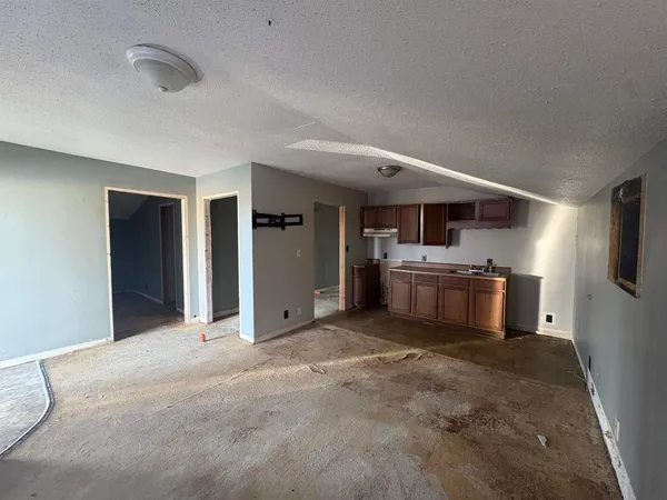 a view of a kitchen with a sink