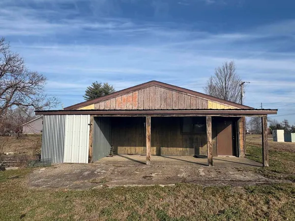 a view of storage and utility room with windows