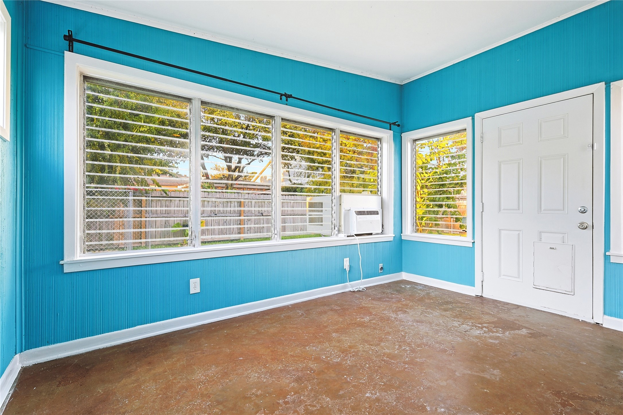 106 Trout Avenue Galveston, TX 77550 - Photo 13 of 21 a view of an empty room with a window