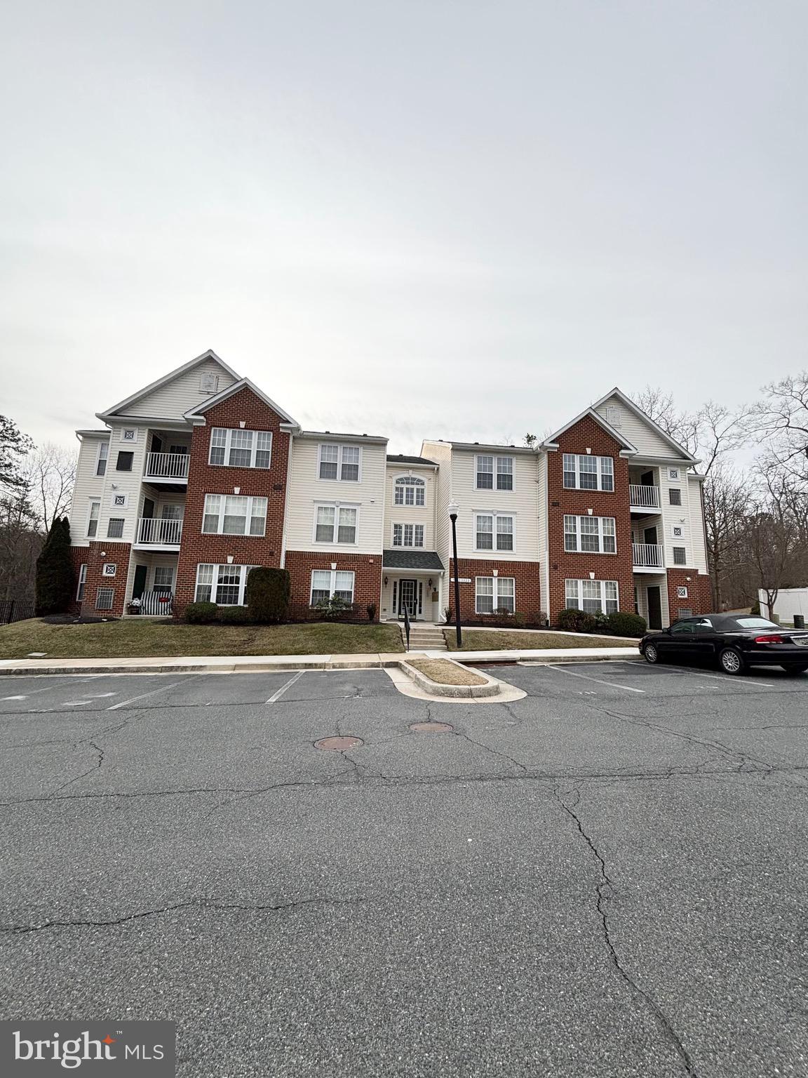 5014 Marchwood Court, Unit 7F Perry Hall, MD 21128 - Photo 1 of 16 a view of multiple houses with a street