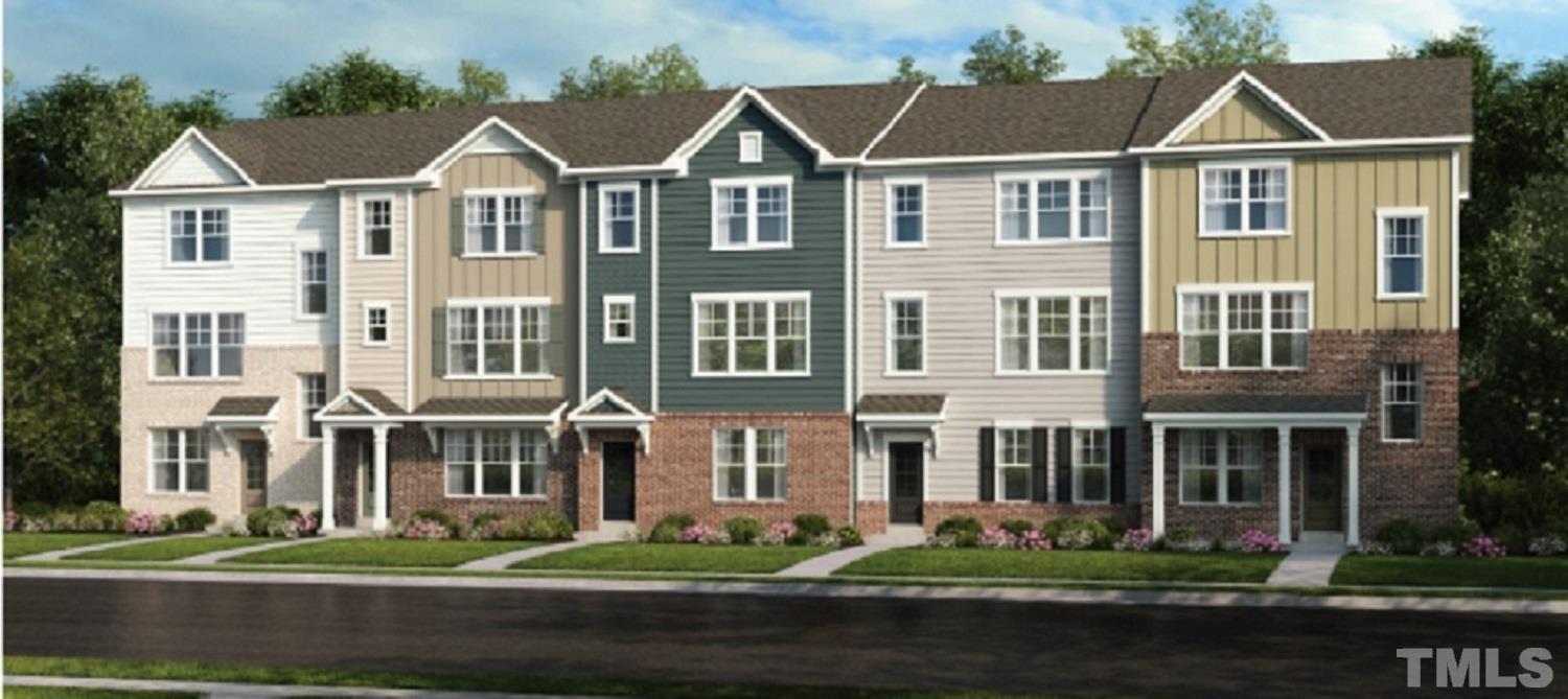 3231 Lynn Road, Unit 41 Raleigh, NC 27613 - Photo 1 of 12 a front view of residential houses