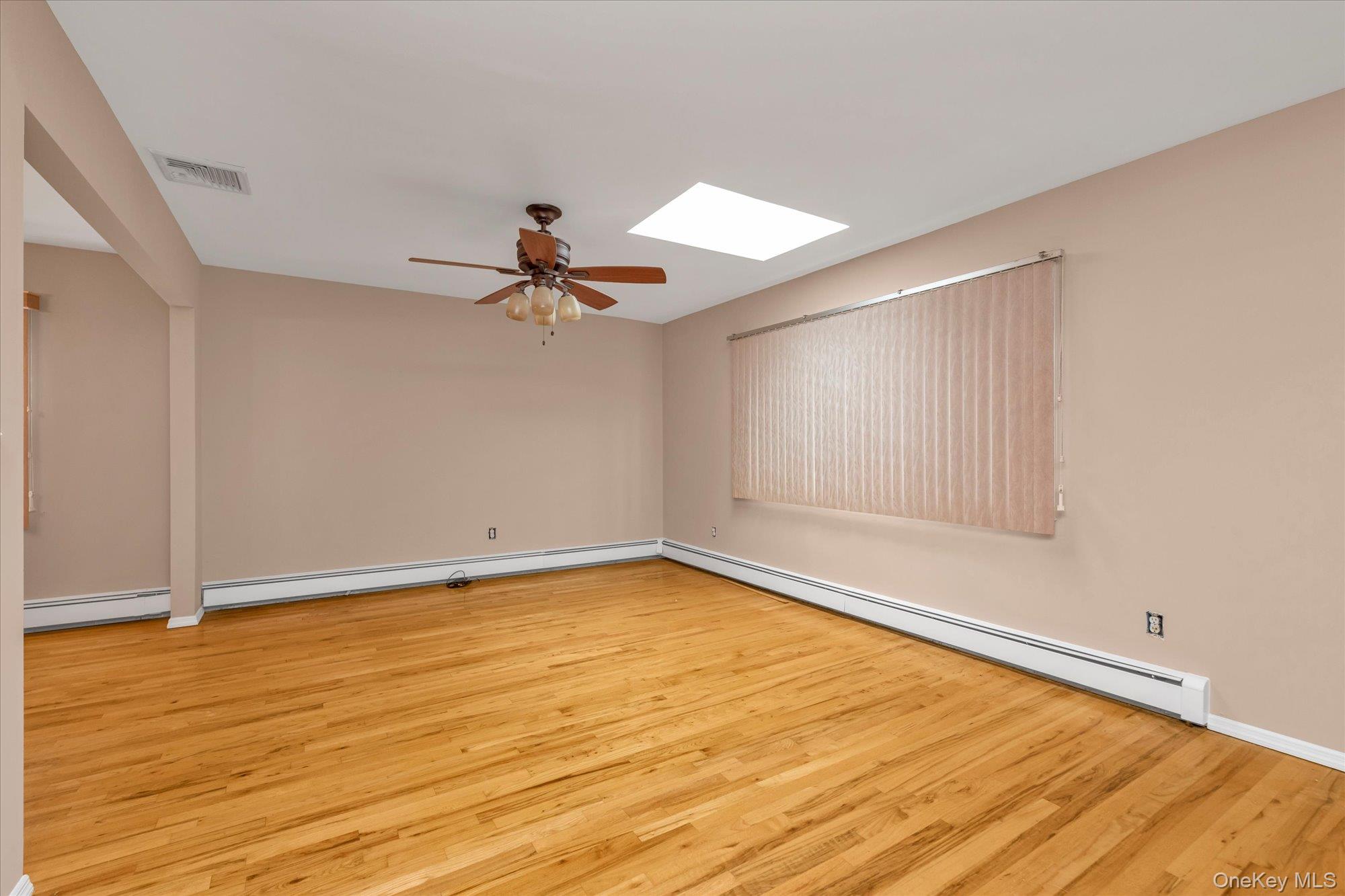 49 Prospect Street Roosevelt, NY 11575 - Photo 3 of 21 Living room