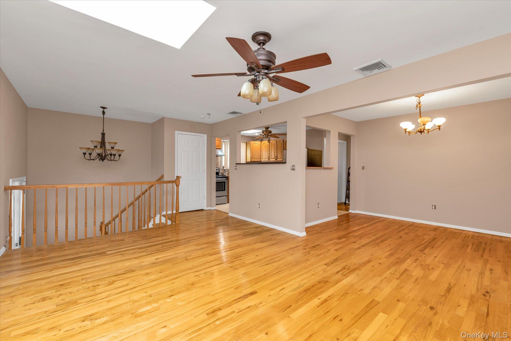 49 Prospect Street Roosevelt, NY 11575 - Photo 4 of 21 View from living room towards dining room and kitchen