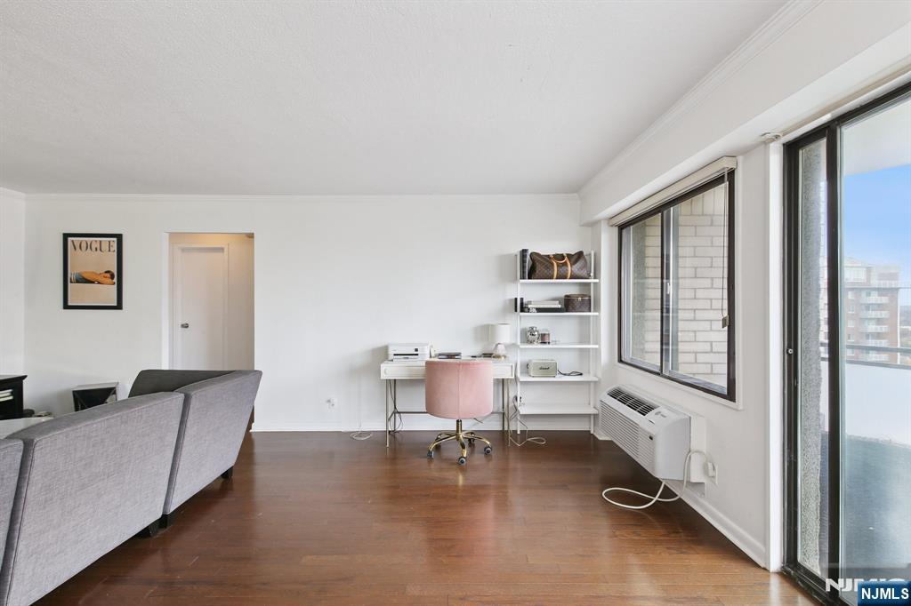 125 Prospect Avenue, Unit 17G Hackensack, NJ 07601 - Photo 20 of 30 a room with furniture