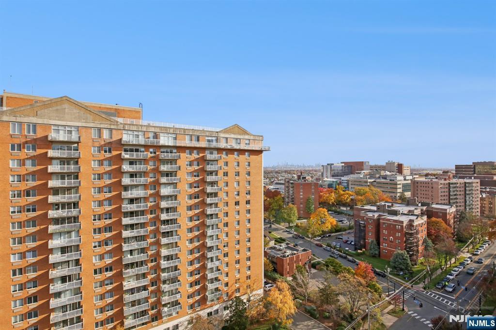 125 Prospect Avenue, Unit 17G Hackensack, NJ 07601 - Photo 24 of 30 a view of a city with tall buildings