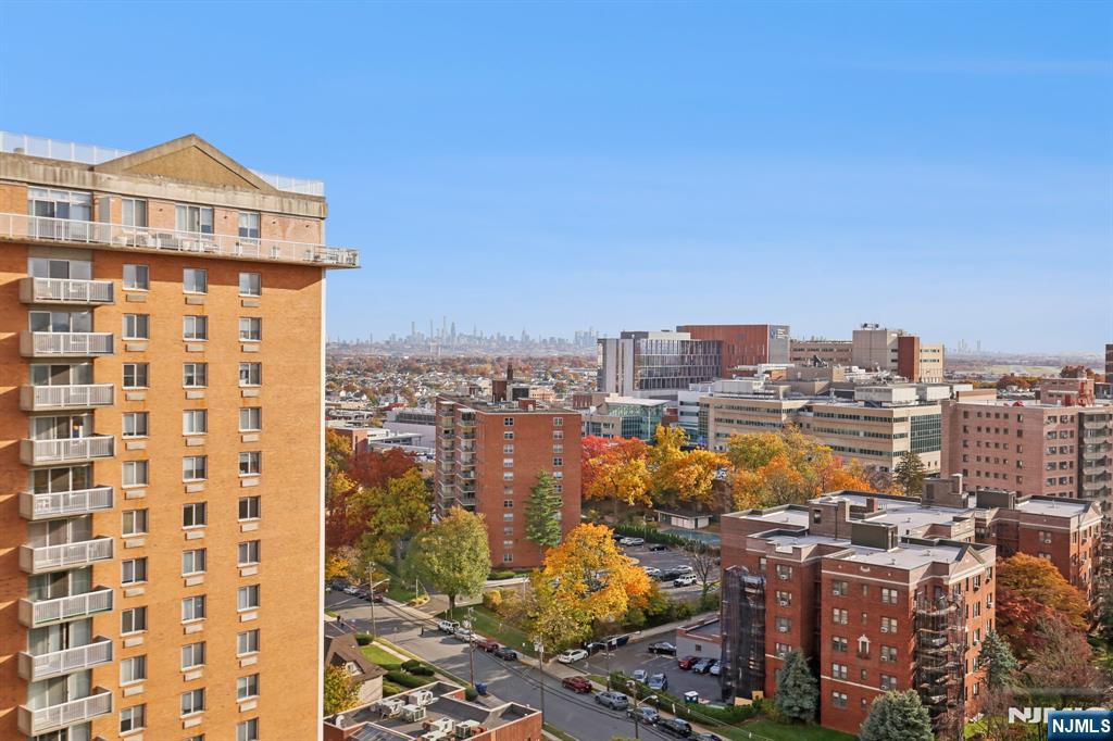 125 Prospect Avenue, Unit 17G Hackensack, NJ 07601 - Photo 25 of 30 a view of a city with tall buildings