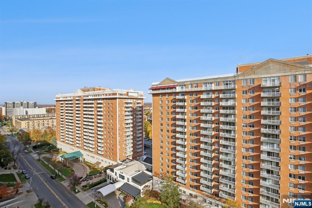 125 Prospect Avenue, Unit 17G Hackensack, NJ 07601 - Photo 26 of 30 a view of a city with tall buildings