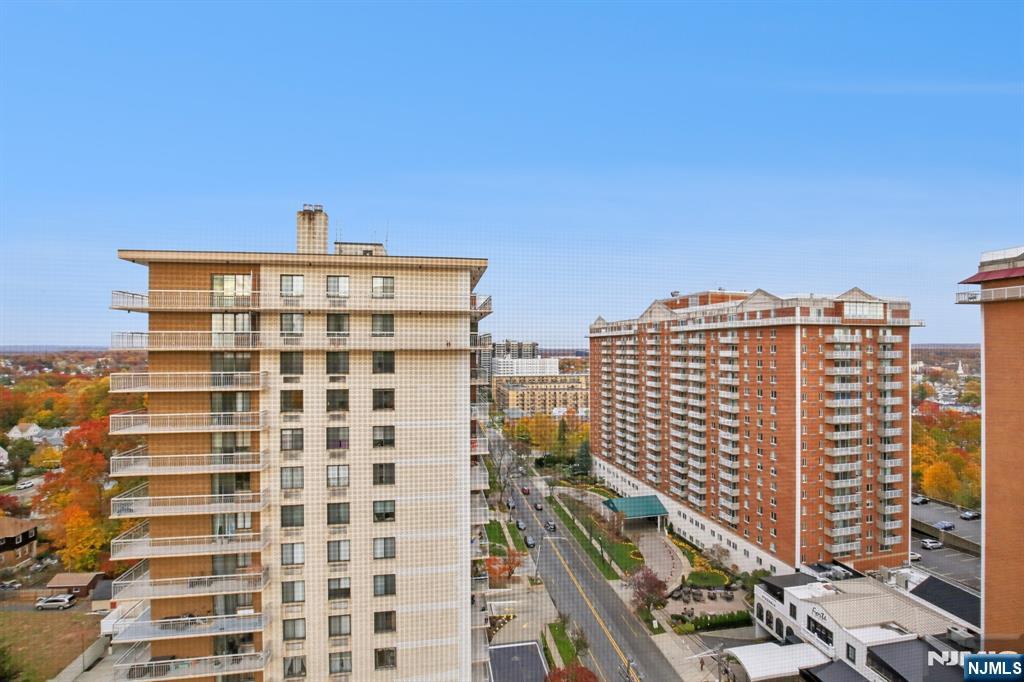 125 Prospect Avenue, Unit 17G Hackensack, NJ 07601 - Photo 27 of 30 a view of a city with tall buildings