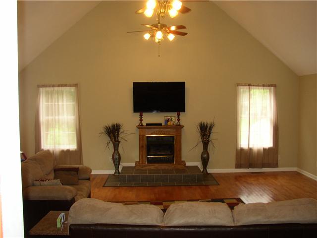 1302 Kasserman Switch Road Belvidere, TN 37306 - Photo 2 of 13 L/R with vaulted ceiling, fireplace, hardwood and look at the space.