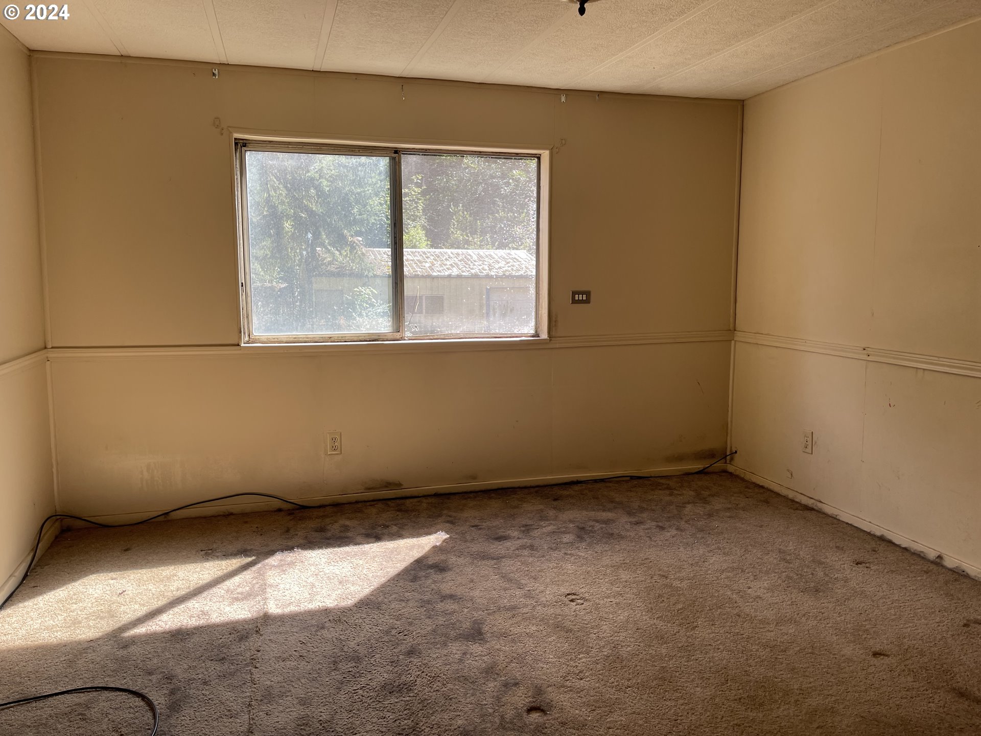58525 Southwest Hebo Road Grand Ronde, OR 97347 - Photo 5 of 17 a view of a room with a window