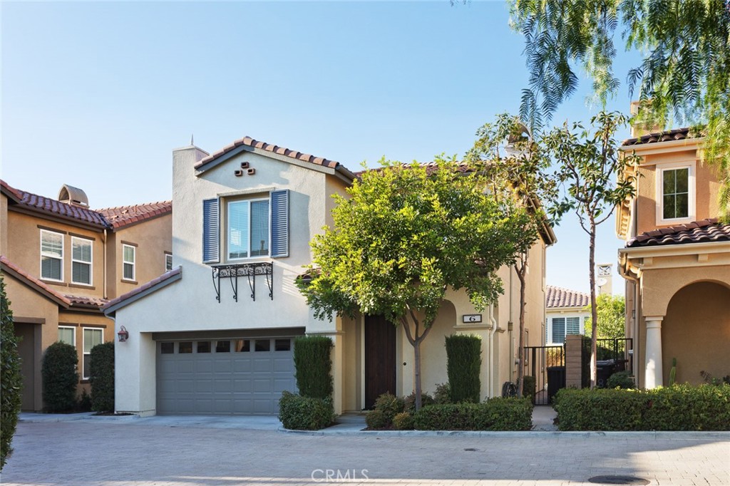 6 Somerset Court Laguna Niguel, CA 92677 - Photo 1 of 1 a front view of a house with plants