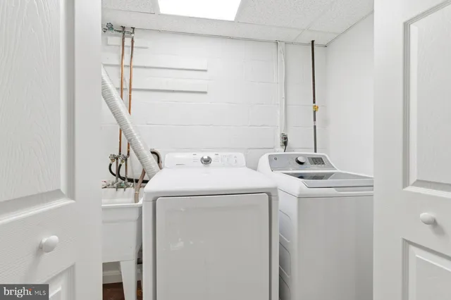 a utility room with dryer and washer