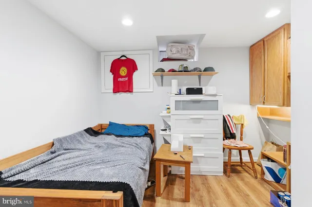 a bedroom with a bed and furniture