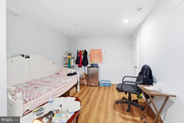 a workspace with furniture and wooden floor