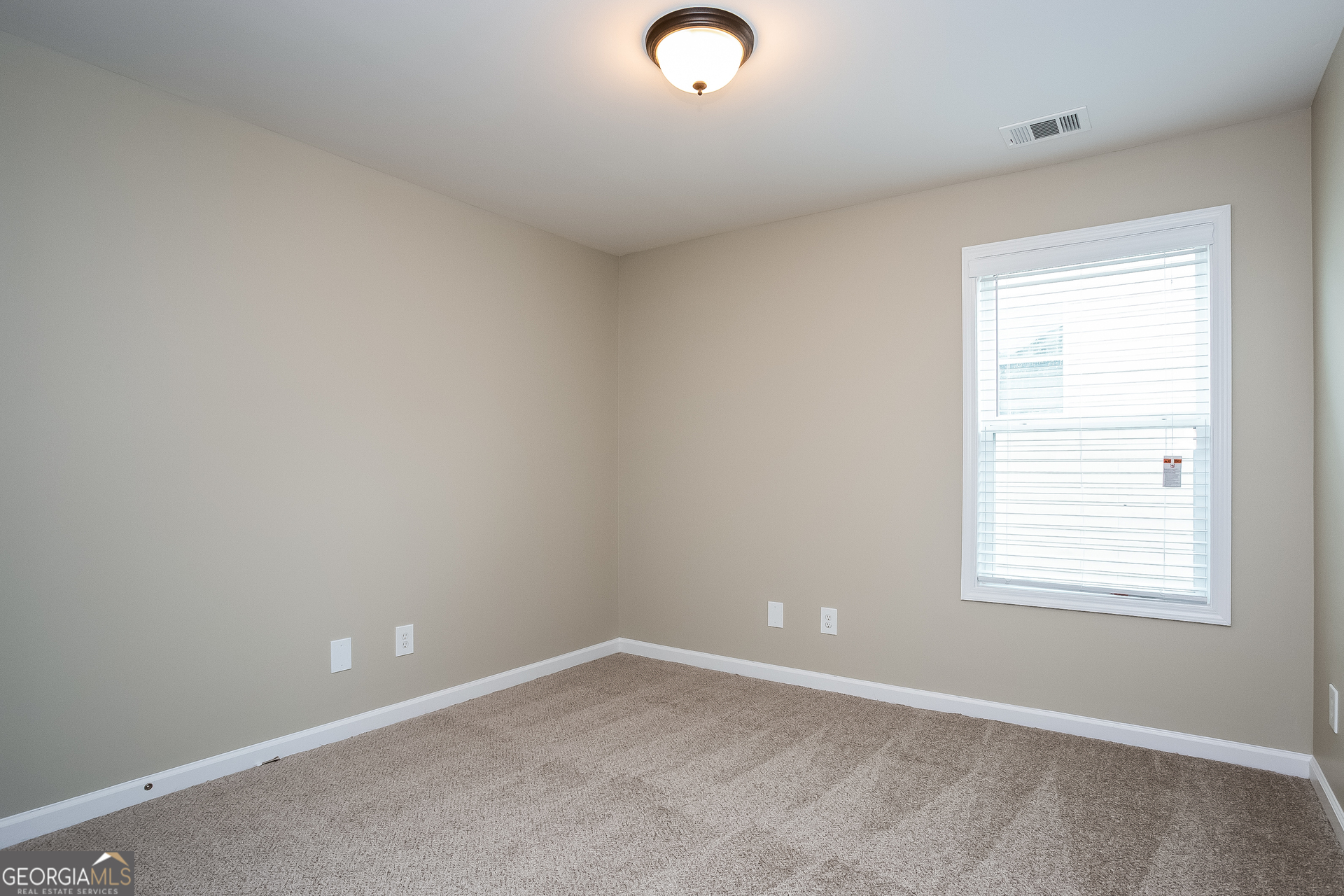 2729 Palmview Court Southwest Atlanta, GA 30331 - Photo 11 of 15 an empty room with a window