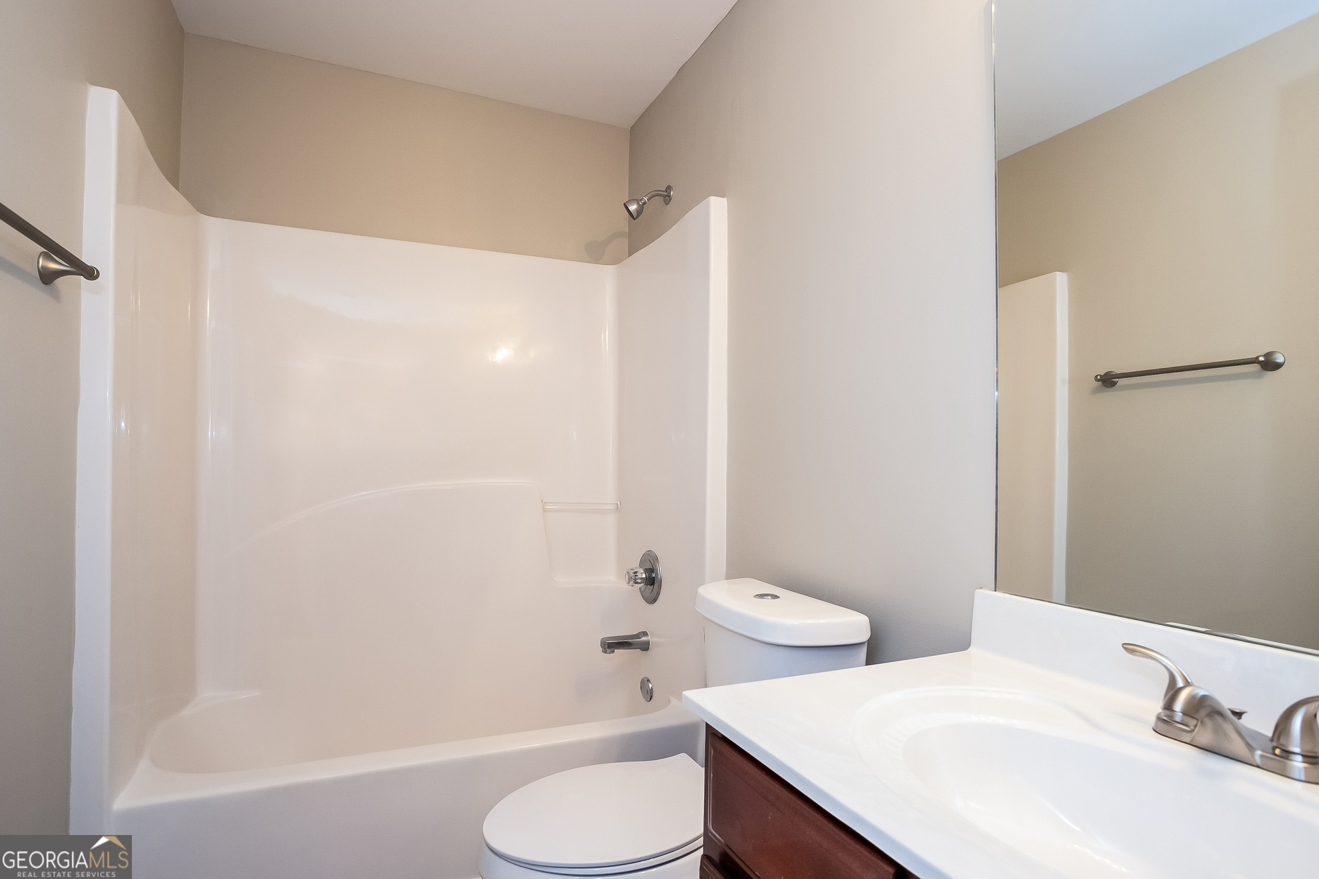 2729 Palmview Court Southwest Atlanta, GA 30331 - Photo 13 of 15 a bathroom with a sink toilet and shower