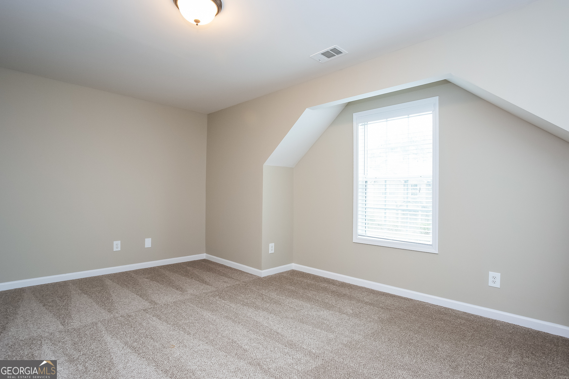 2729 Palmview Court Southwest Atlanta, GA 30331 - Photo 10 of 15 an empty room with windows
