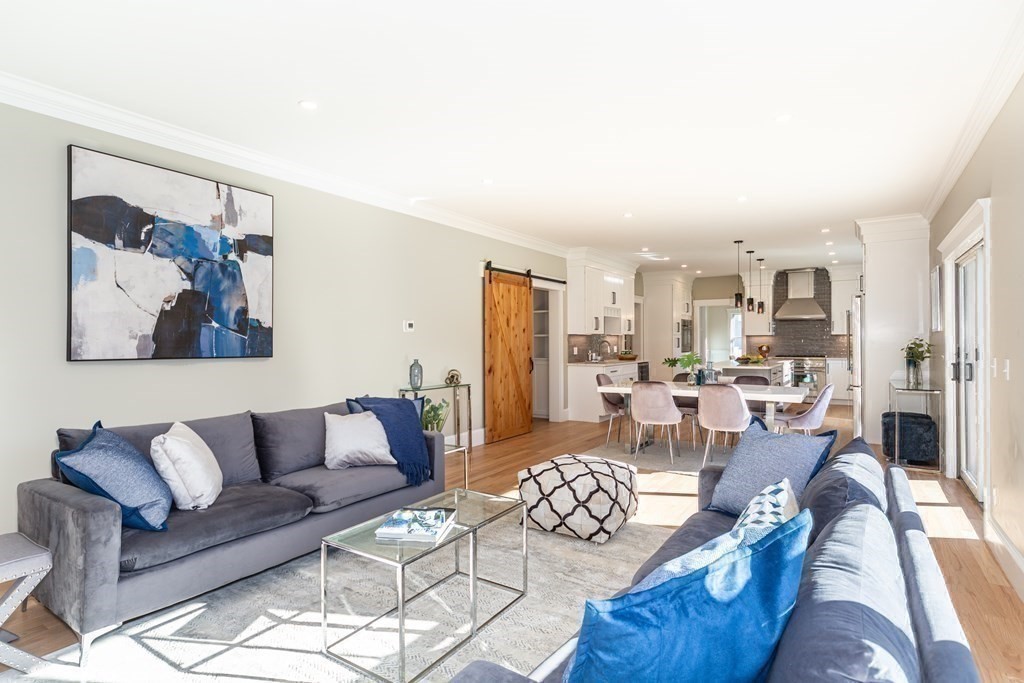 4 Whitcomb Street Natick, MA 01760 - Photo 20 of 42 a living room with furniture and a painting
