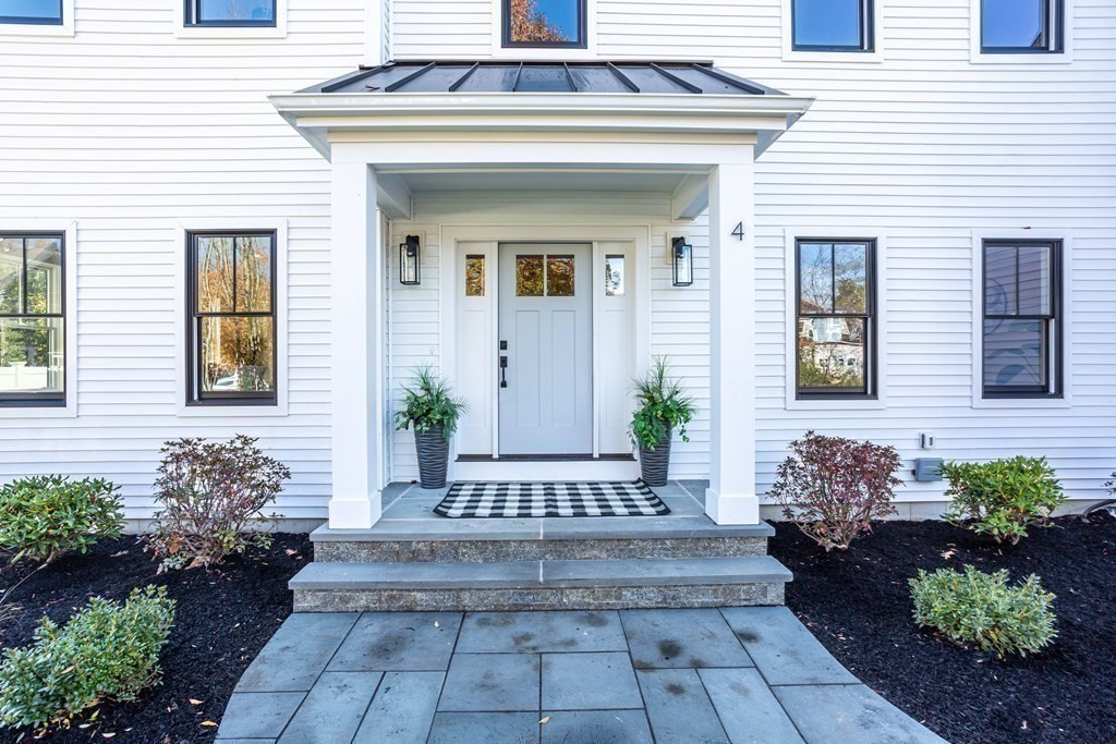 4 Whitcomb Street Natick, MA 01760 - Photo 2 of 42 a view of a entryway of the house
