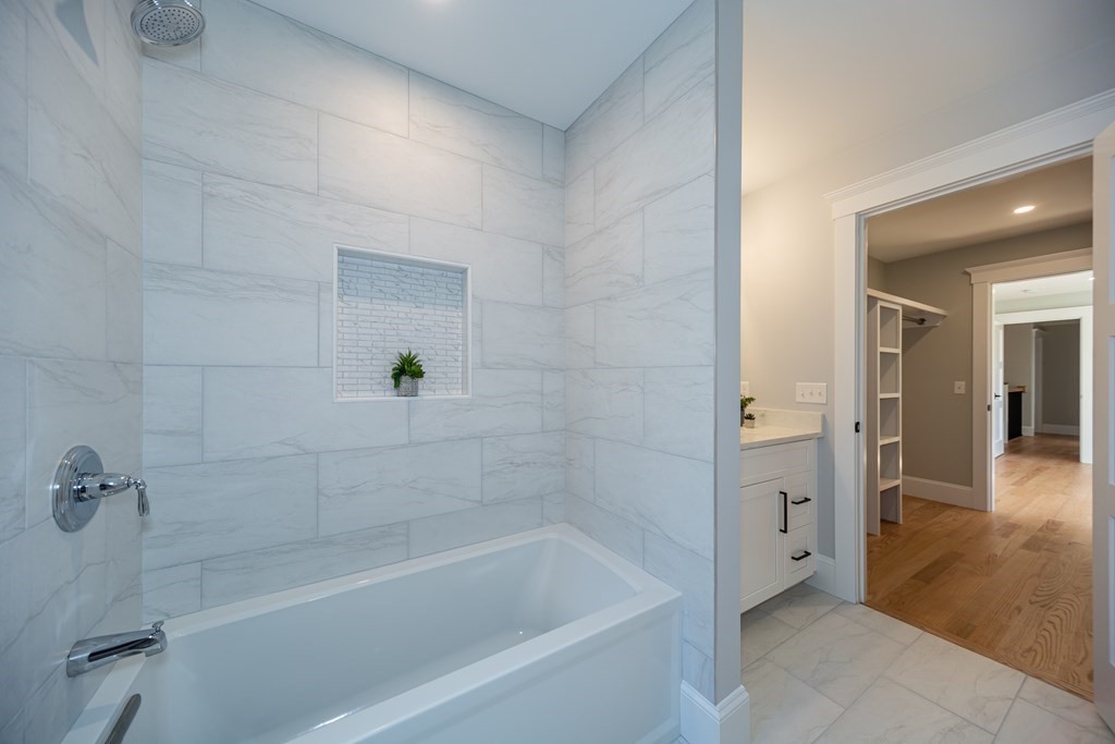 4 Whitcomb Street Natick, MA 01760 - Photo 33 of 42 a bathroom with a bathtub