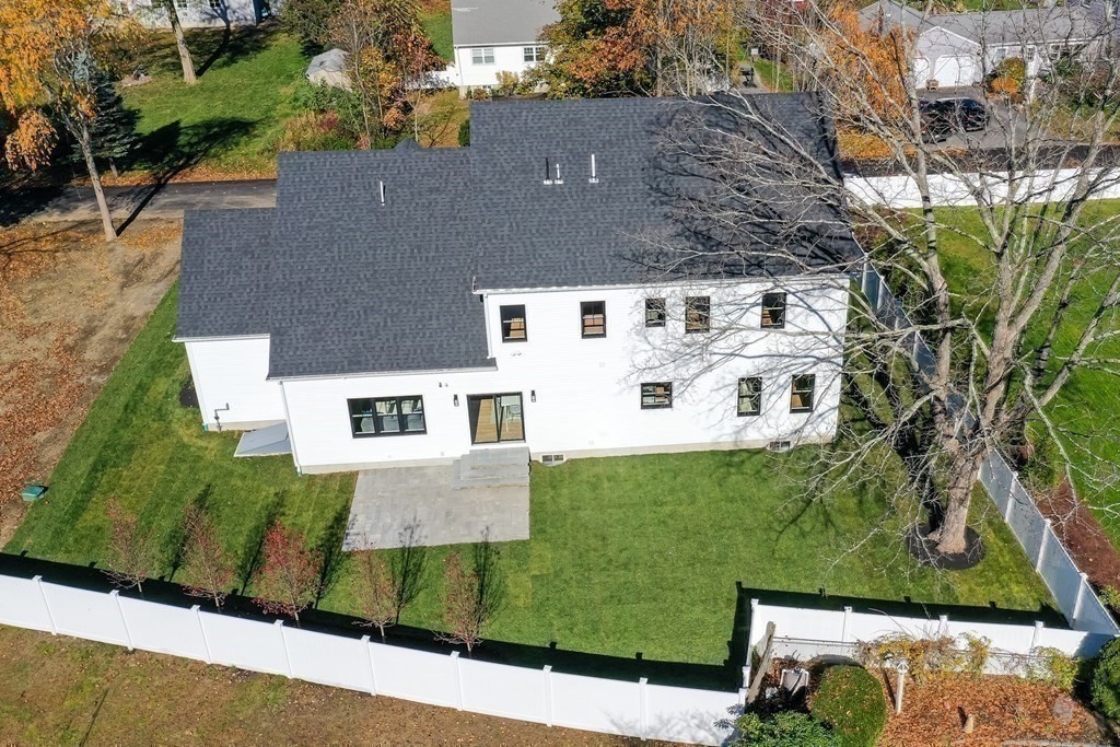 4 Whitcomb Street Natick, MA 01760 - Photo 42 of 42 an aerial view of a house with a yard