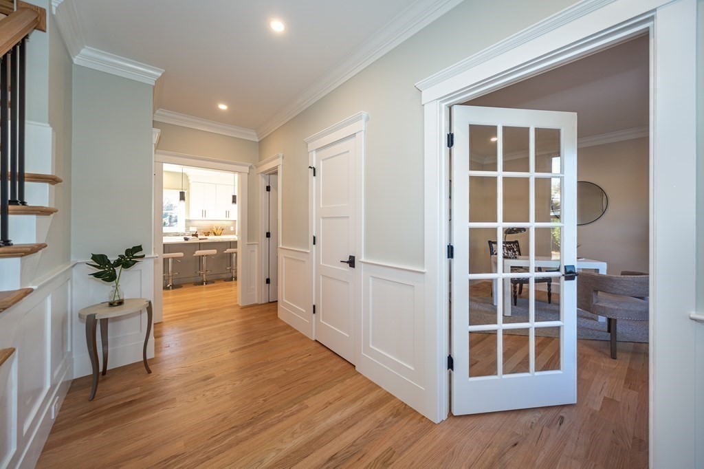 4 Whitcomb Street Natick, MA 01760 - Photo 6 of 42 a view of a big room with wooden floor and windows